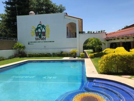 Hotel SKY & PALMS - Housity