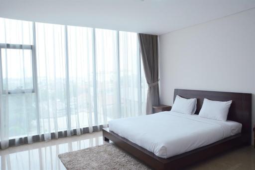 Comfy 1BR L'Avenue Apartment By Travelio - Housity