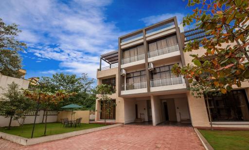 StayVista's Greenwoods Villa 1 - City-Center Villa with Private Pool, Terrace, Lift & Carrom Board - Housity