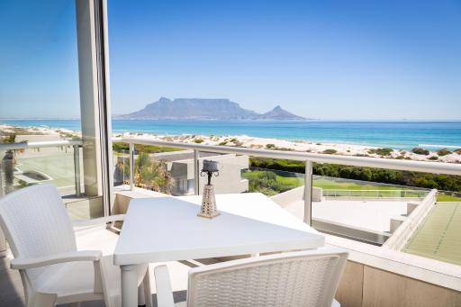 Luxury Private Beachfront 2 bedroom Dolphin Apartment, Blouberg, Cape Town - Housity