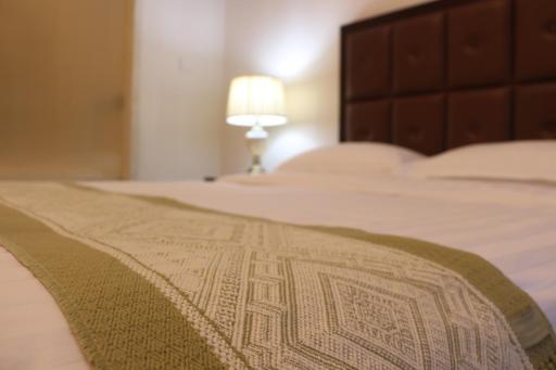 Qingdao Elegant Central Apartment - Housity