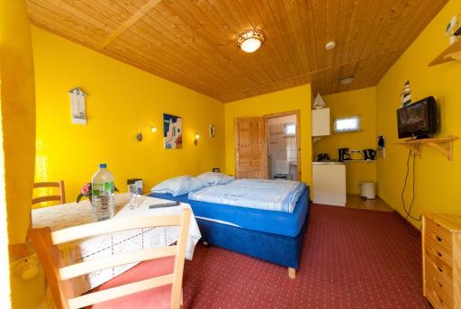Alte-Strandvogtei-Sellin-Garten-Bungalow-1-direkt-im-Herzen-vom-Ostseebad-Sellin - Housity