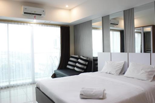 Bright Studio @ Tamansari La Grande Apartment By Travelio - Housity