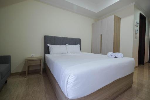 Simply Furnished Studio at Menteng Park Apartment By Travelio - Housity