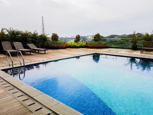 Homey Studio Room Tree Park City BSD Apartment near BSD City By Travelio - Housity