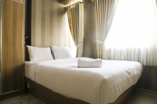1BR with Extra Balcony The Oasis Cikarang Apartment By Travelio - Housity