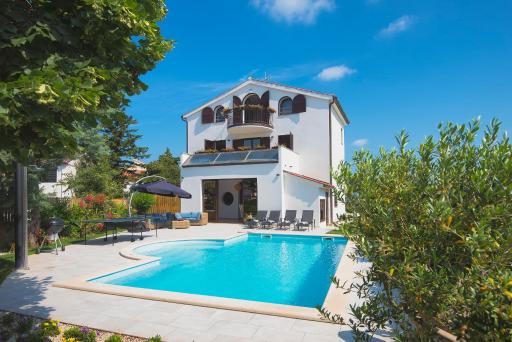 Villa Andrija Family Dream with heated pool at the sea with beautiful garden, outside cinema and kids playground - Housity