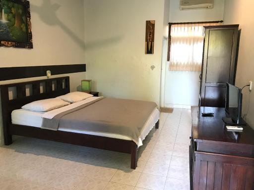 Mangga Bali Inn - Housity