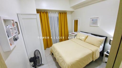 Cozy Condo at Wind Residences - Housity