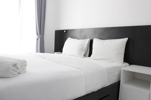 Monochrome Style Studio Room @Grand Asia Afrika Apartment By Travelio - Housity