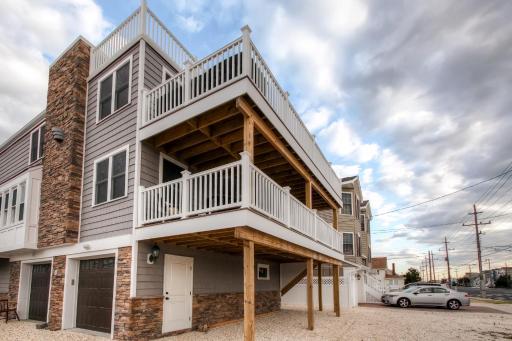 Recently Renovated LBI Apt with Deck on Beach Block! - Housity