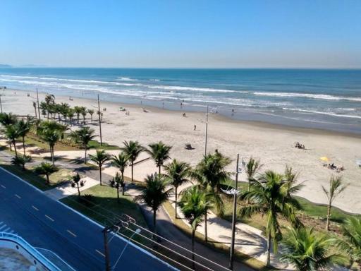 Apartamento Praia Grande, Vila Tupi, em frente ao mar, com retirada de chaves na casa da proprietária - Housity