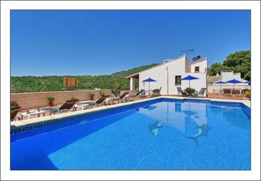 Casas Rurales Juzcar Centro - Housity