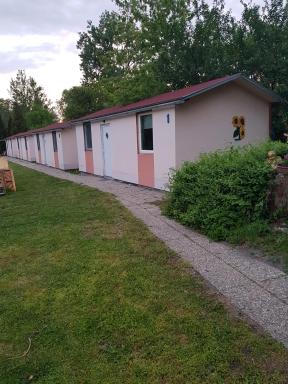Napraforgó Apartmanok - Housity