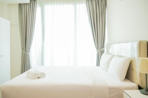 Cozy and Relax Studio Room at Tree Park City BSD Apartment By Travelio - Housity
