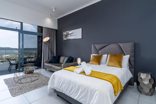 Top Floor Menlyn Maine studio apartment with Stunning Views & No Load Shedding - Housity