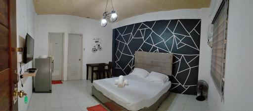 DJCI Apartelle Walk to Robinson & NE Pacific Mall 3 Min to SM Cabanatuan - Housity