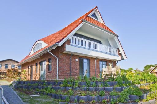gemütliche Ferienwohnung mit Terrasse und Garten - Ferienhaus Zaunkönig FeWo EG - Housity