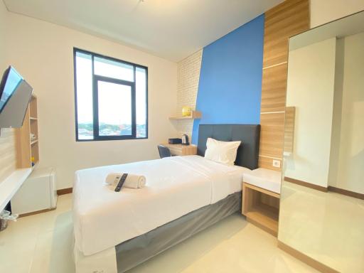 Comfortable Studio Semi Apartment at The Lodge Paskal near BINUS University By Travelio - Housity