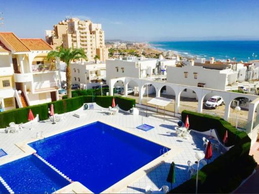Apartment with pool & balcony less than 10min walk to La Mata Beach! - Housity