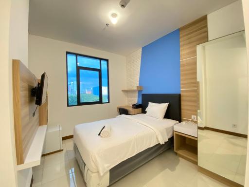 Smart Studio Room Semi Apartment at The Lodge Paskal near BINUS University By Travelio - Housity