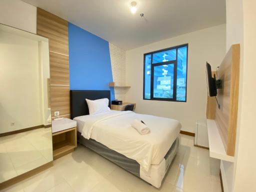 Simply Studio Room Semi Apartment at The Lodge Paskal near BINUS University By Travelio - Housity