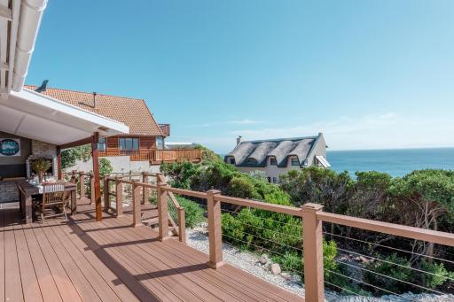 Oceanfront bungalow 3 br/2 ba, Wifi Fireplace: Guppy Huys - Housity