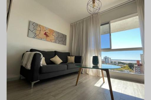 Confortable estudio con vista al Rio Parana. - Housity