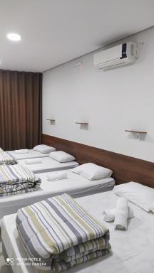 Flat familiar com ar,wi fi,cozinha e garagem - Housity