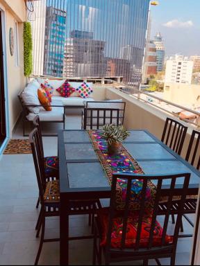 Apartament Condo Amueblado, ENCOMENDEROS 200 El Golf, Las Condes Santiago con vista al Costanera Center - Housity