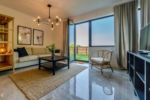 Apartament nadmorski z ogródkiem - Housity