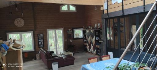 Suite parentale dans maison en bois Carcans - vue jardin - Housity