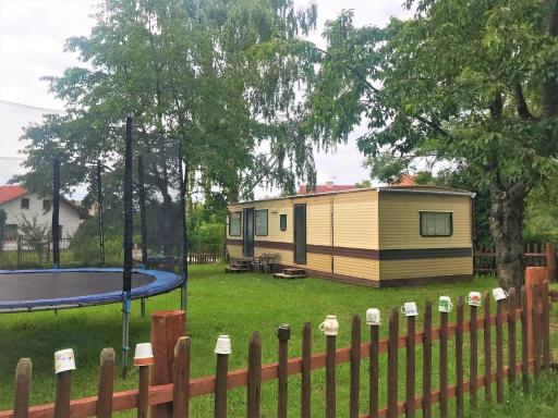 V zahradě u koupaliště - Housity