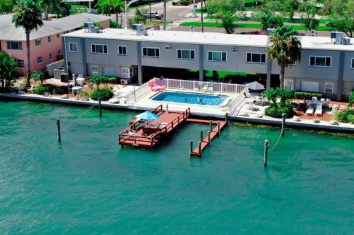 102-Tiny Treasure-Waterfront with Heated Pool - Housity