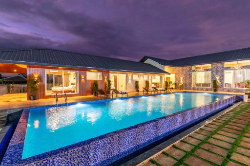 Ferias Vita by StayVista with Turf, Rainshower, Lawn, Swimming pool and Gazebo - Housity