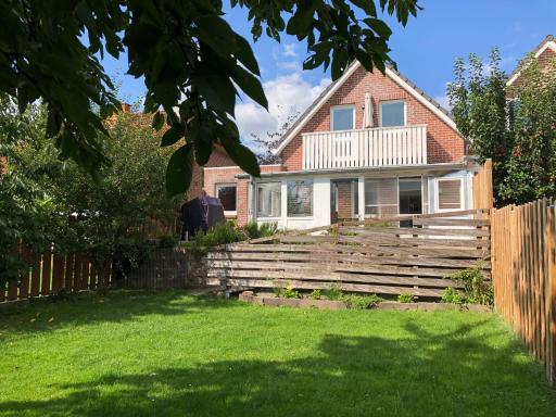 Baumberger Ferienhaus mit Garten & Wintergarten mit 3 Schlafzimmern & 2 Bädern - Housity