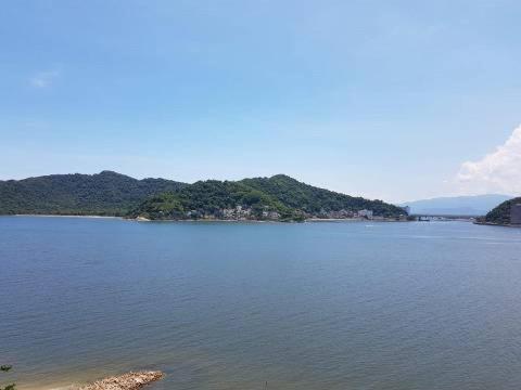 Kitnet pé na areia! Vista espetacular ! - Housity