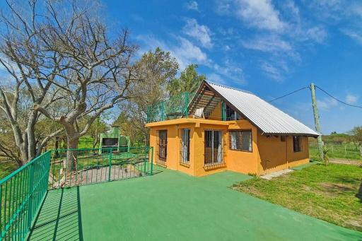 Cabaña Ipora con vista al río Negro y al muelle - Housity