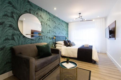 Studio Palms Steps from JeanTalon Market Full Bath by Den Stays - Housity