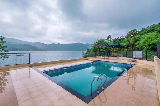 SaffronStays Riverdale, Mulshi - Lakefront villa with pool and mountain view - Housity