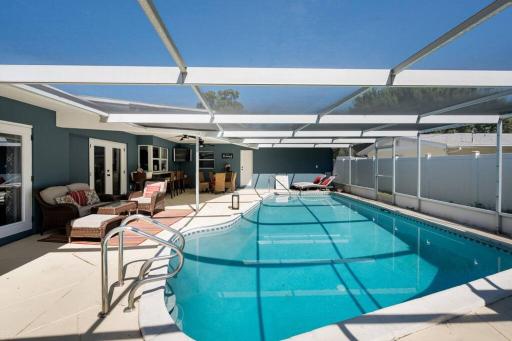 Elegant Heated Pool Home 12 minutes to the beaches of Anna Maria Island and IMG Academy - Housity