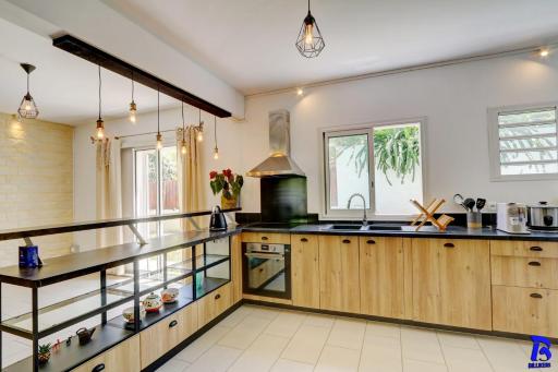 Appartement Ô COEUR DU NORD, classé 4 étoiles, rez-de-chaussée, jardin, 4 personnes, Sainte Clotilde, Saint Denis - Housity