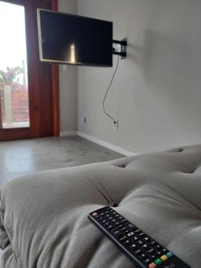 RiqueHouse: Hidro, churrasqueira a 500 m da praia - Housity