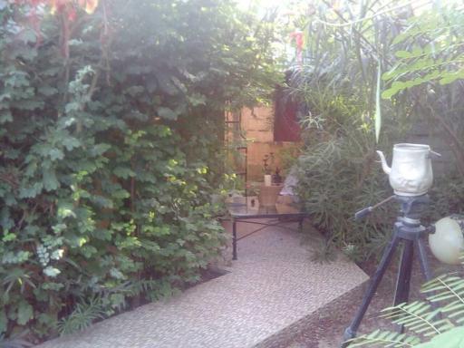 Lovely 3-Bdrm Cottage w Private Patios Pkg Sanyang - Housity