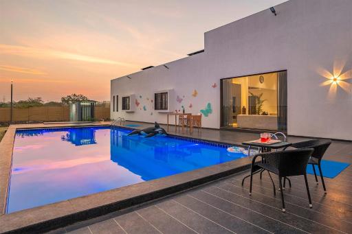 StayVista's Le Bon Horizon - Hillside Elegance with Chic Interiors, Poolside Serenity & Picturesque Gazebo - Proximity to Sula - Housity