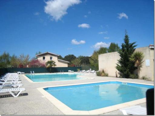 Maison confortable a Hourtin 45 m² avec piscine partagee sur place ! - Housity