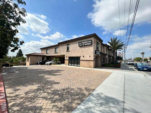 ASPIRE INN & SUITES Orange - Housity
