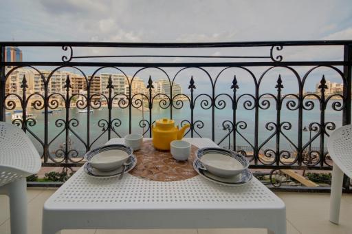 St Julians 2 Bedroom Apartment with Commanding Seaviews by ShortletsMalta - Housity