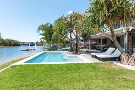 Coorumbong 28 Six Bedroom Beach Home on Mooloolaba Canal with Pool AC Free WiFi - Housity