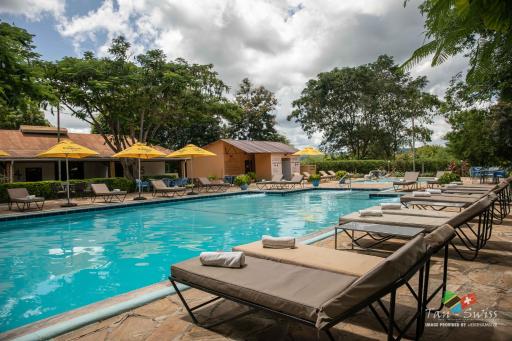 Tan-Swiss Lodge - Housity